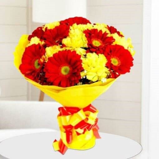 Red and Yellow Flower in Yellow Wrap