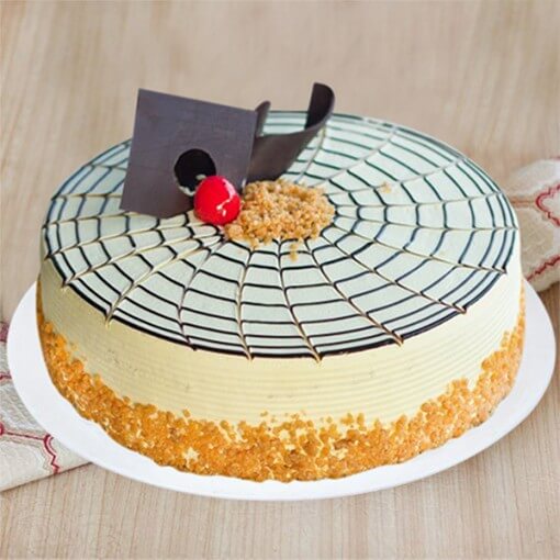 round-shape-butter-scotch-cake-with-single-cherry-on-middle-top