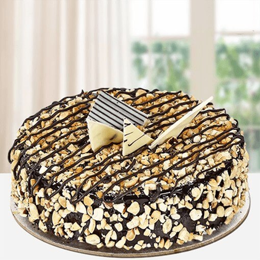 crunchy-choco-cake-with-nuts-layered-on-it
