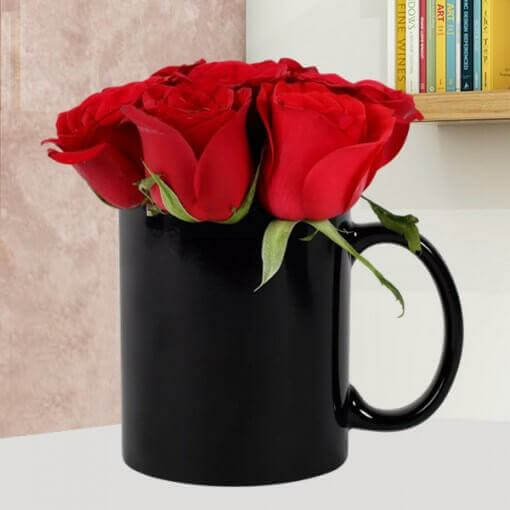 black-mug-with-red-roses-inside-it