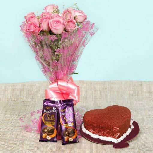 red-velvet-heart-shape-cake-Cadbury-chocolates-with-pink-color-roses-bouquet
