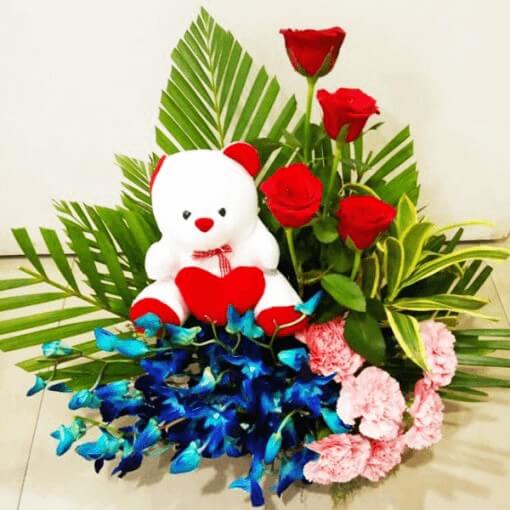 colorful-flowers-lilies-roses-with-teddy-bunch
