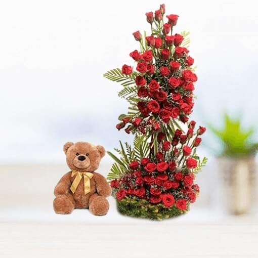 brown-teddy-with-red-flowers-bouquet