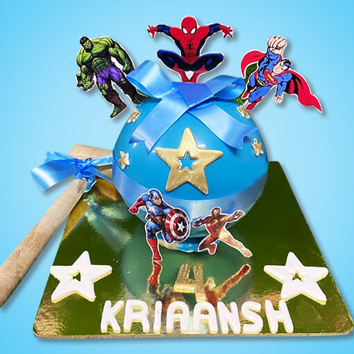 chocolate-pinata-cake-with-hammer-on-superhero-theme