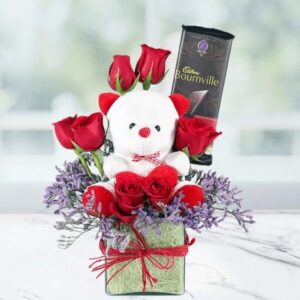 Vase of Roses with Teddy Bear